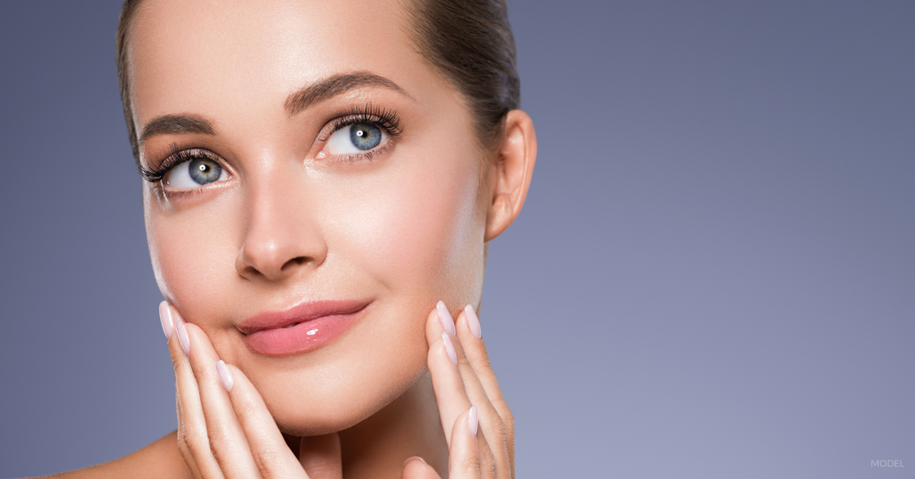 Woman with snatched jawline after injectables. (Model)